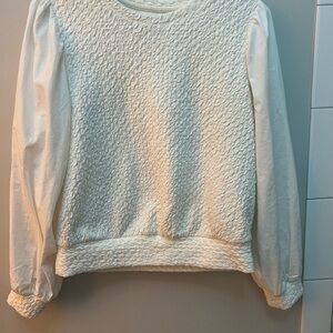 White long sleeve top.